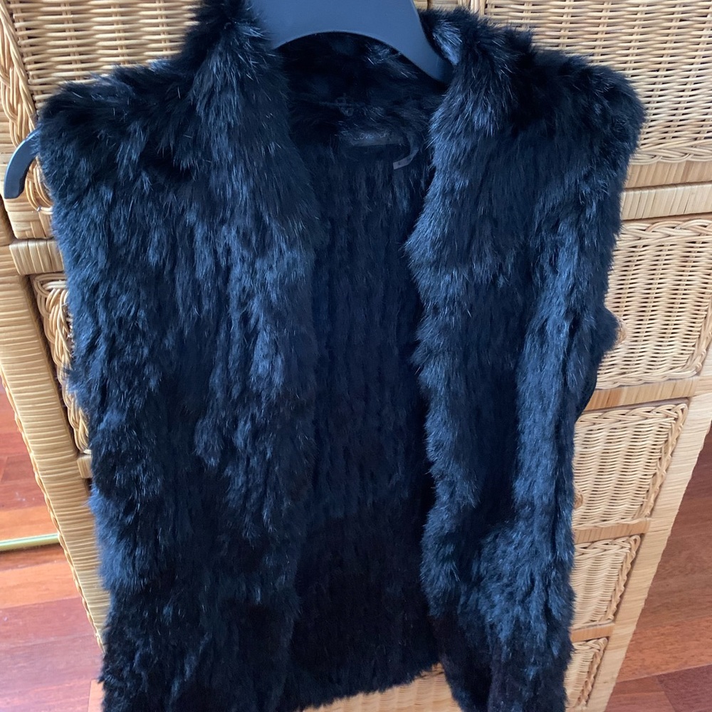 Sleeveless fur vest.  Great for days that require just an added layer